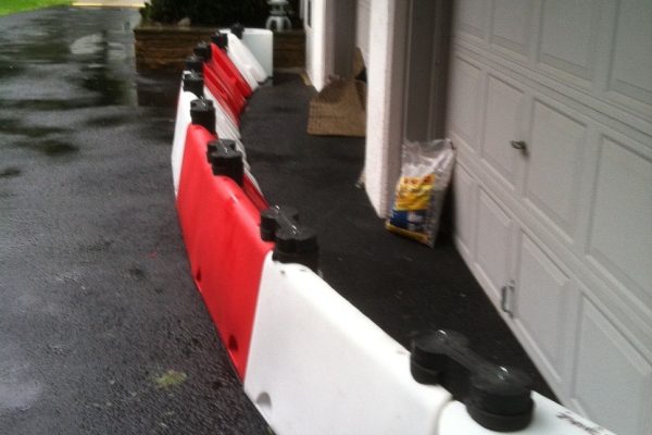 Floodstop flood barrier providing garage protection
